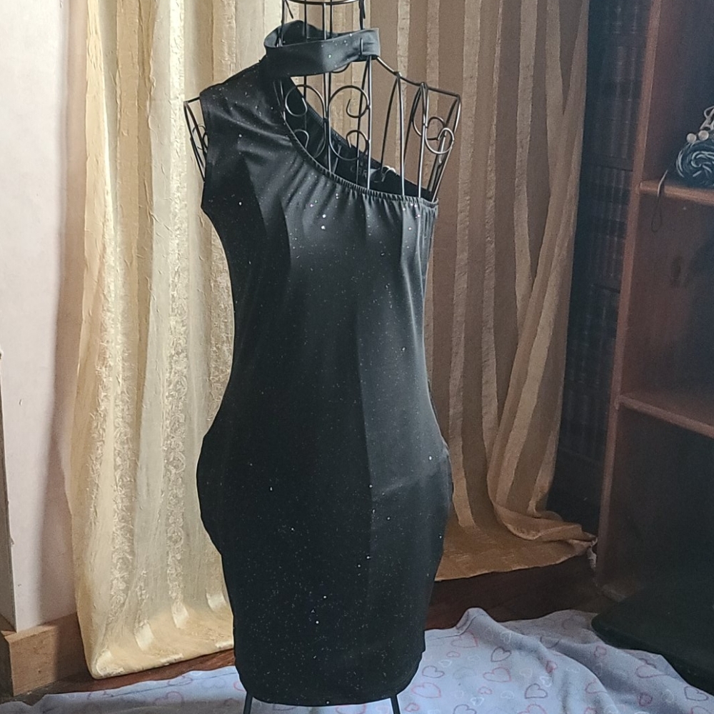 Glitter sequin black mini dress.